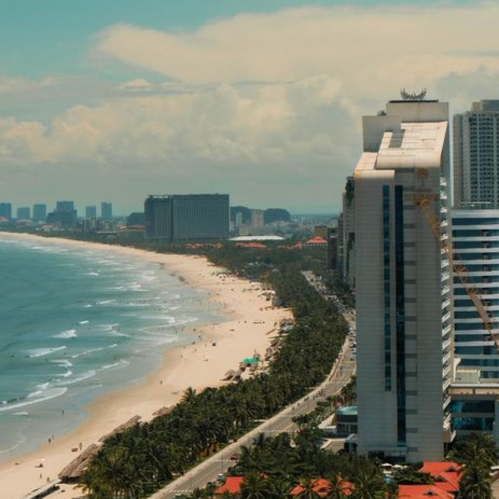Aerial view of My Khe Beach and Da Nang skyline on a sunny day