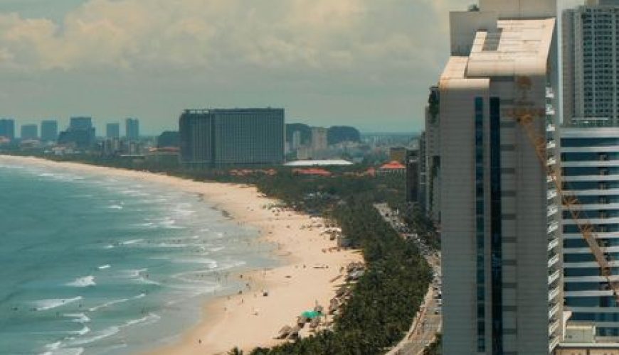 Aerial view of My Khe Beach and Da Nang skyline on a sunny day