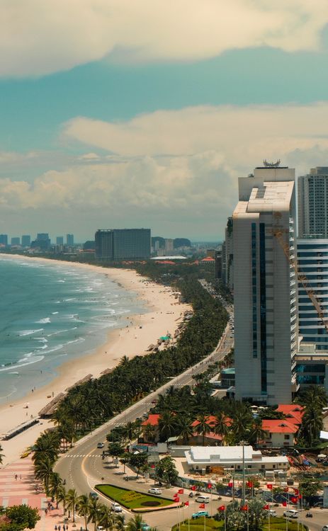 Aerial view of My Khe Beach and Da Nang skyline on a sunny day