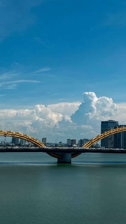 The Dragon Bridge spanning the Han River in Da Nang, Vietnam on a clear day