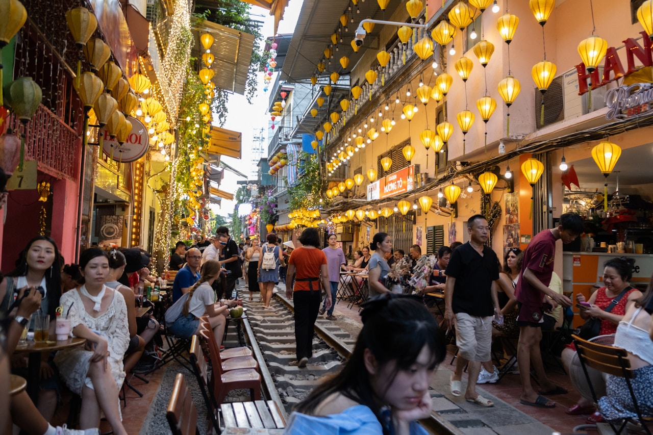 People walking and shopping in Hanoi Old Quarter street