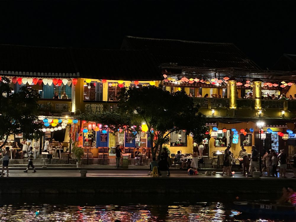 Hoi An Ancient Town lit by colorful lanterns along the river at night