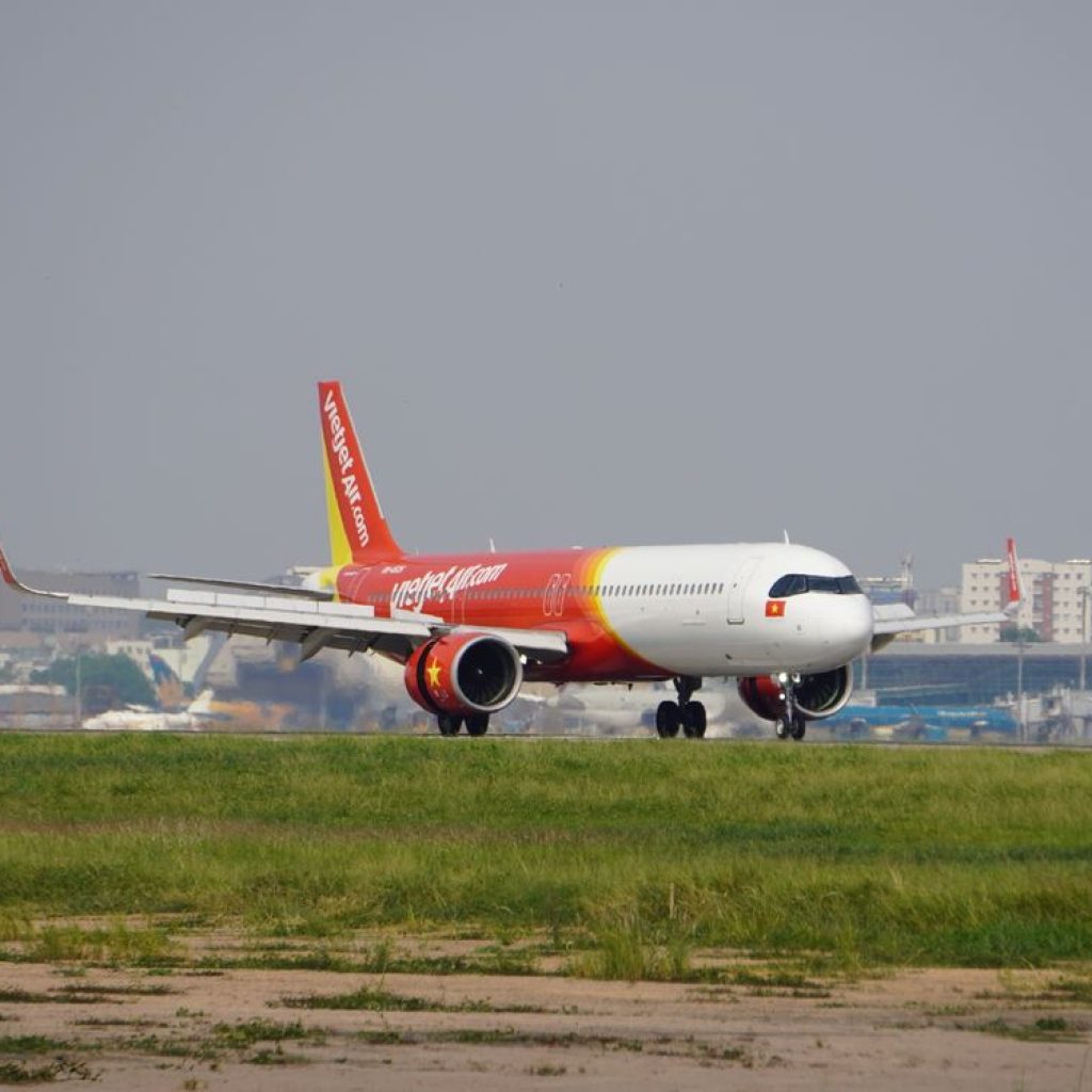 A commercial airplane on the runway at Tan Son Nhat International Airport in Ho Chi Minh City, Vietnam — one of the airports where the new health declaration rule will be enforced