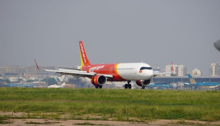 A commercial airplane on the runway at Tan Son Nhat International Airport in Ho Chi Minh City, Vietnam — one of the airports where the new health declaration rule will be enforced