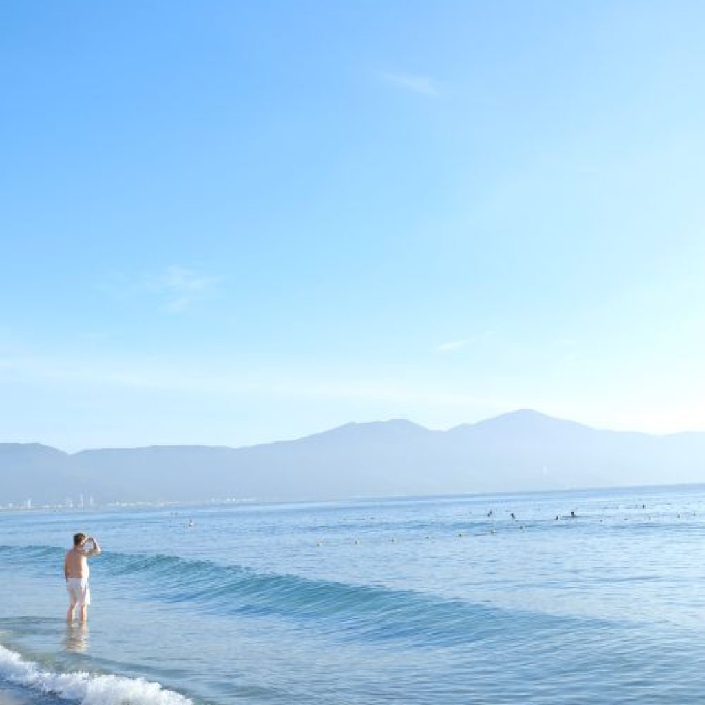 Tranquil beach scene in Da Nang, Vietnam — central Vietnam has the best summer weather in the country.