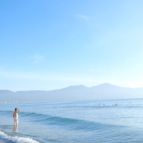 Tranquil beach scene in Da Nang, Vietnam — central Vietnam has the best summer weather in the country.