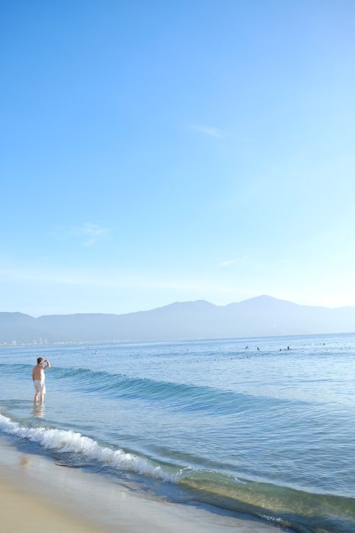 Tranquil beach scene in Da Nang, Vietnam — central Vietnam has the best summer weather in the country.