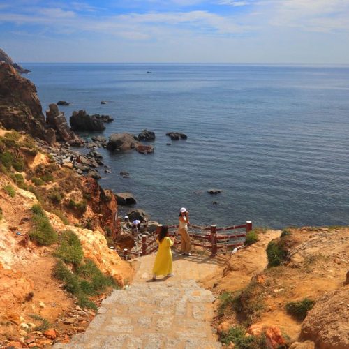 Quy Nhon rocky coastline with turquoise water and dramatic cliffs in central Vietnam