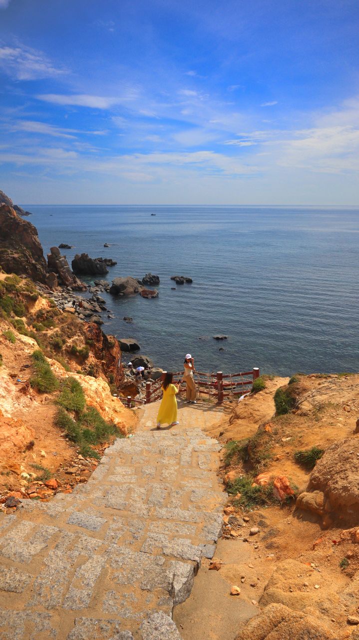 Quy Nhon rocky coastline with turquoise water and dramatic cliffs in central Vietnam