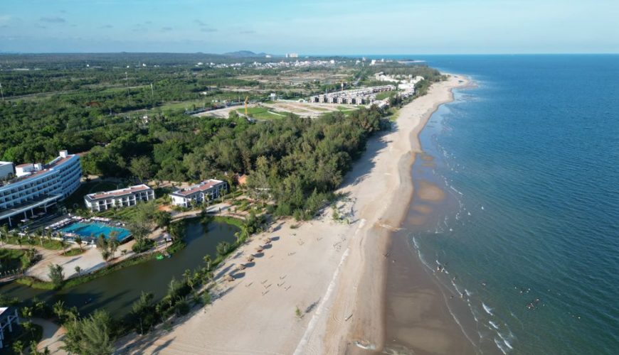 Aerial view of Ho Tram beach coastline with luxury resorts along the shore