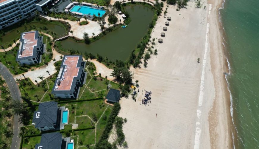Luxury beach resort swimming pool overlooking Ho Tram beach in Vietnam