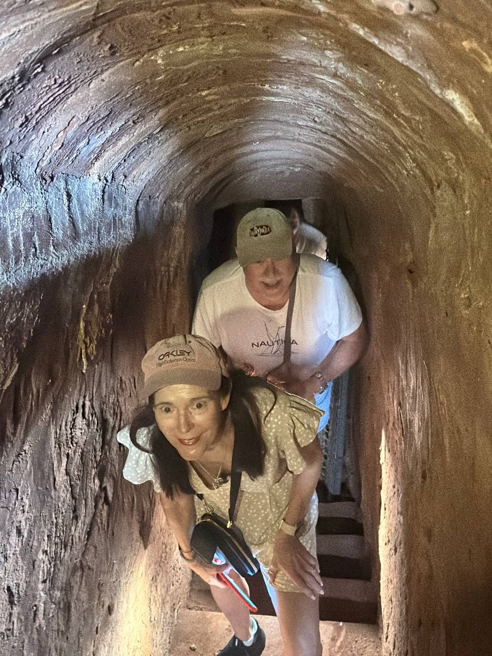 Inside the historic Long Phuoc tunnel system during a Vietnam war history tour