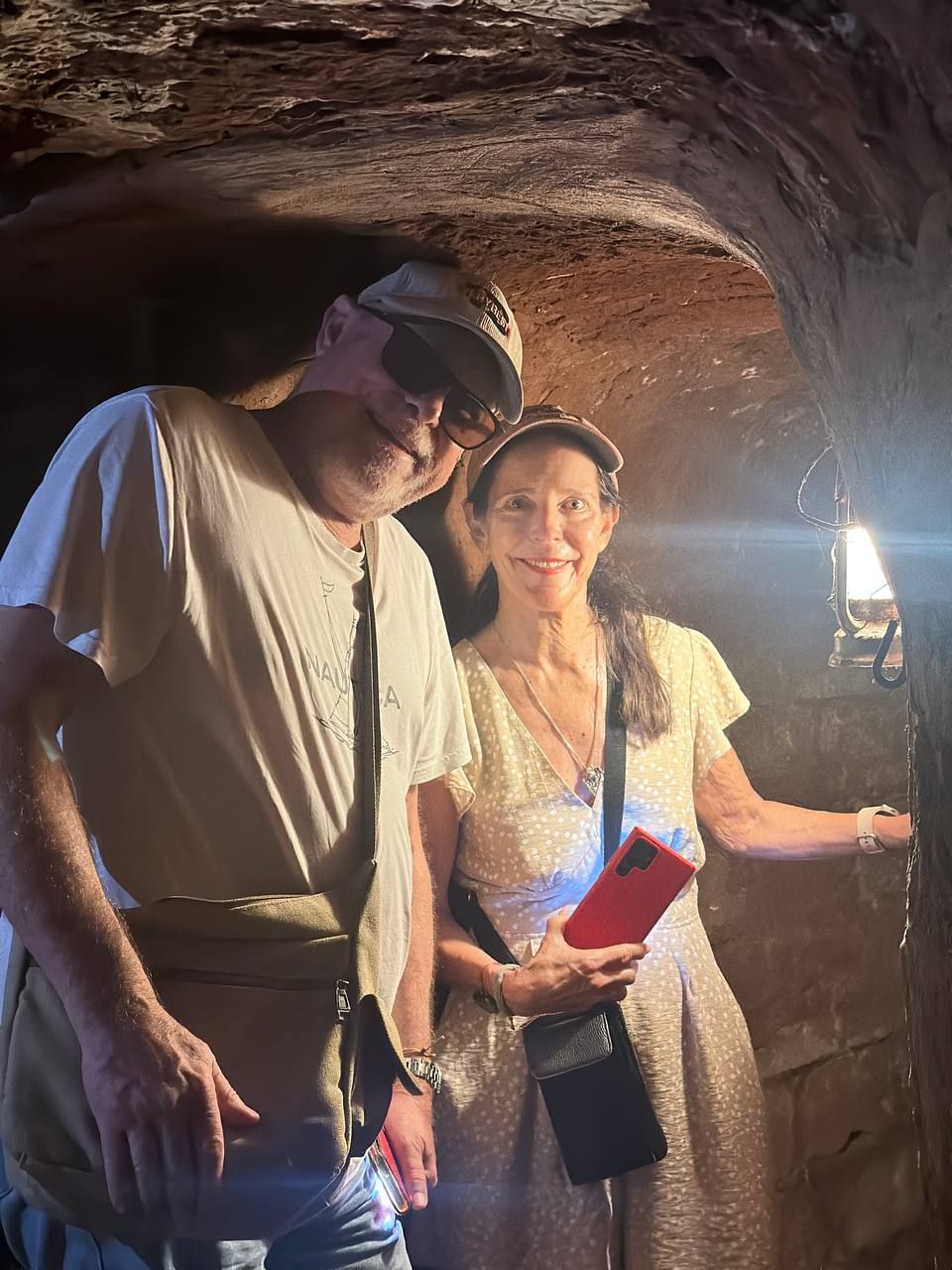 Lantern-lit tunnel passage at Long Phuoc historical site near Vung Tau