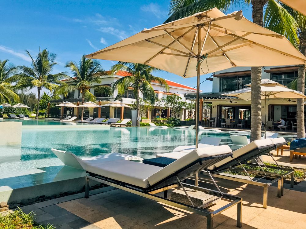 Luxury resort pool with loungers