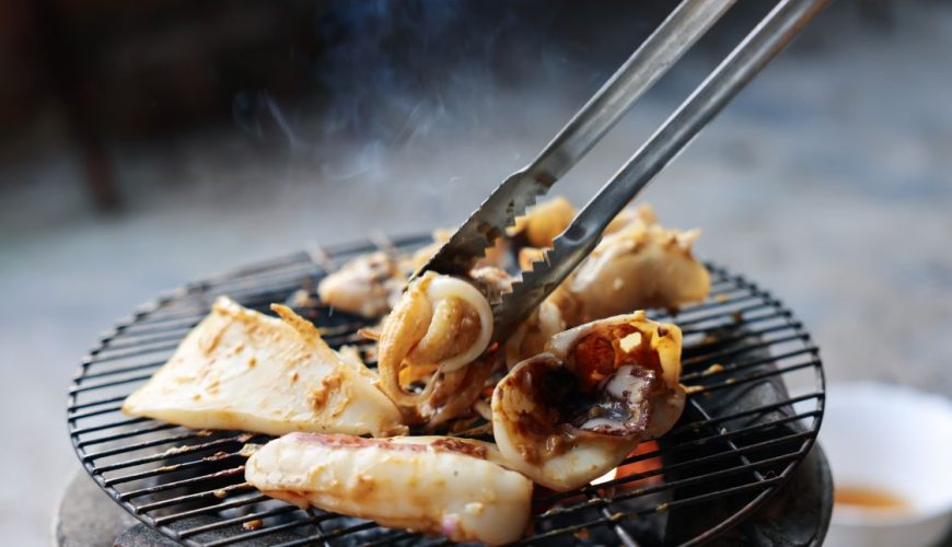 Grilled seafood on a charcoal grill in Nha Trang, Vietnam