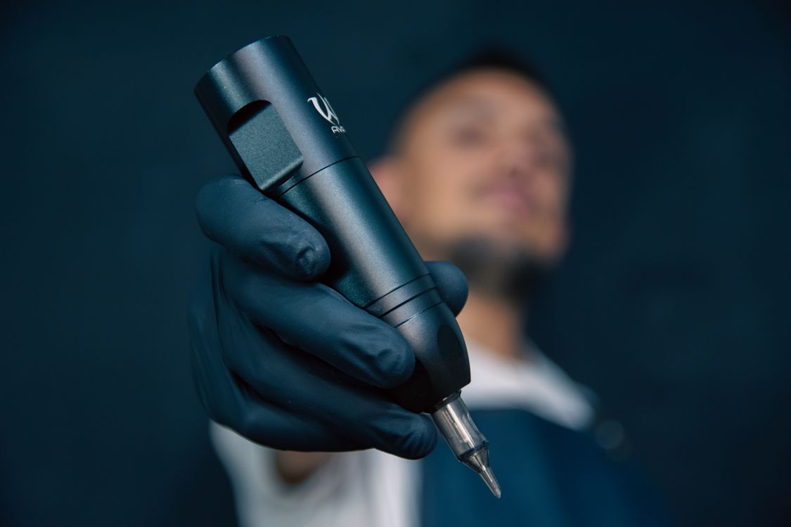 Close-up of a tattoo machine and needle in a clean Da Nang studio