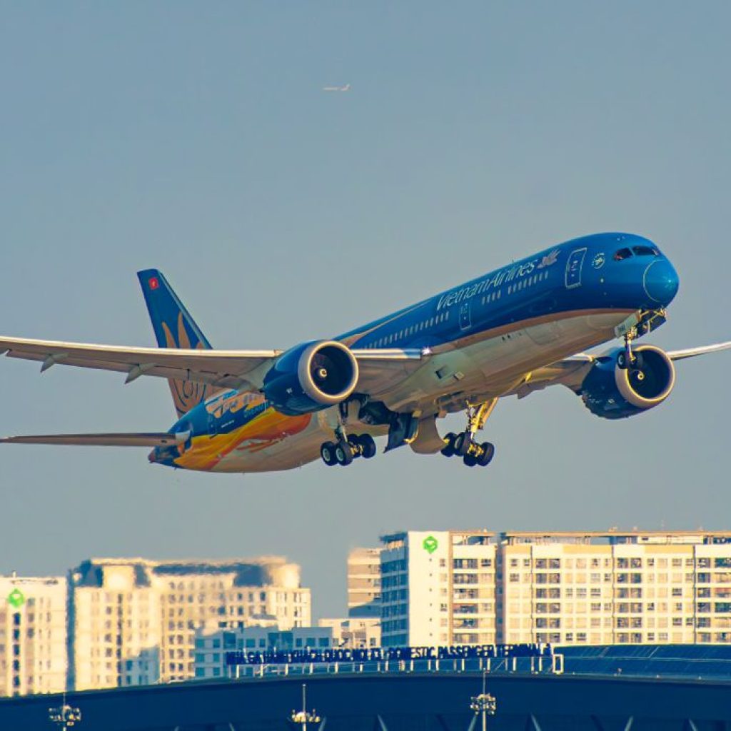 Vietnam Airlines aircraft airborne with landing gear extended