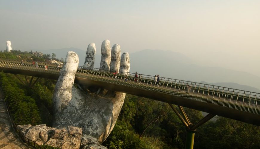 Golden Bridge at Ba Na Hills in Da Nang, held by giant stone hands
