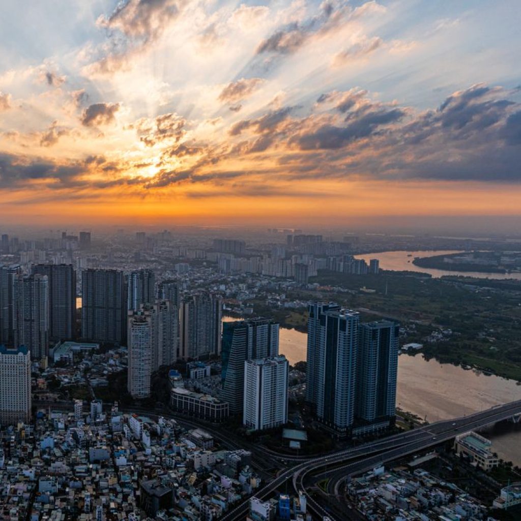 Ho Chi Minh City skyline at sunset above the Saigon River