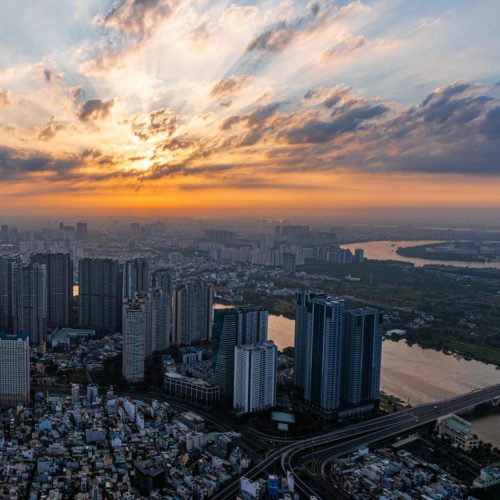 Ho Chi Minh City skyline at sunset above the Saigon River