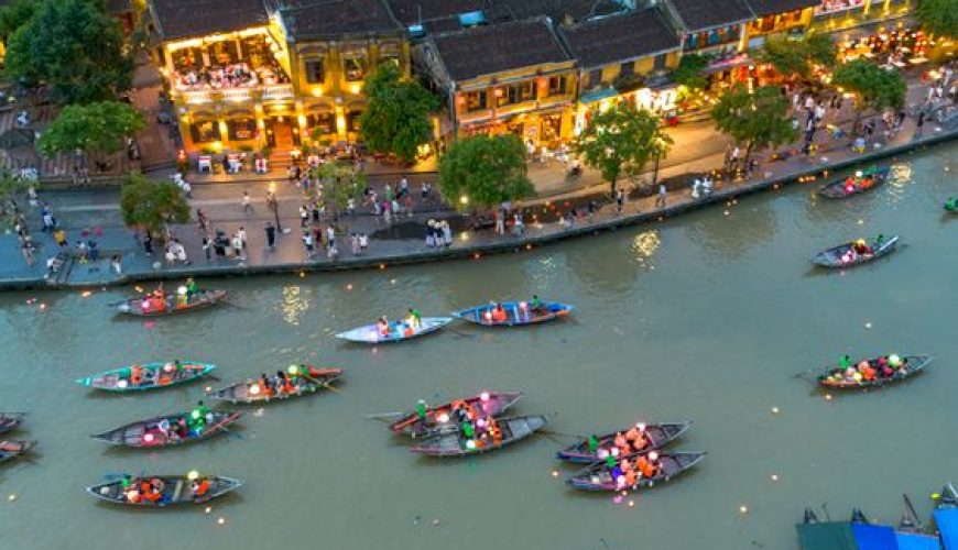 Hoi An Ancient Town lit up with lanterns at night — staying here puts you in the middle of it all