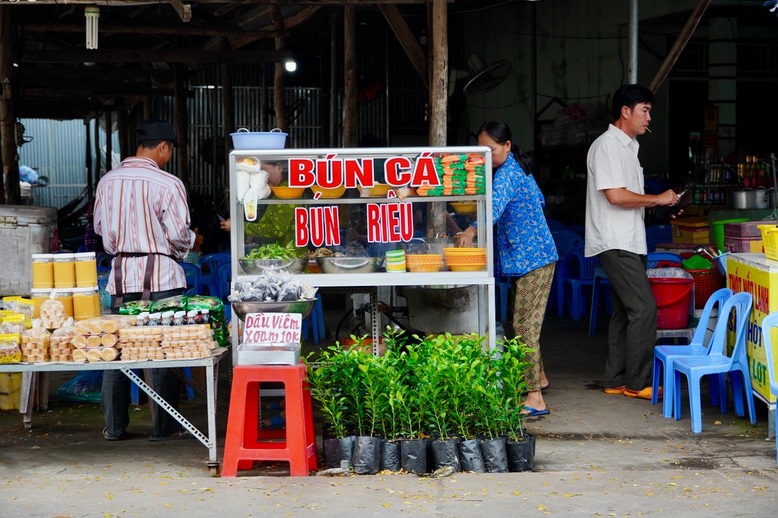 street food market stall in Vietnam selling local specialties