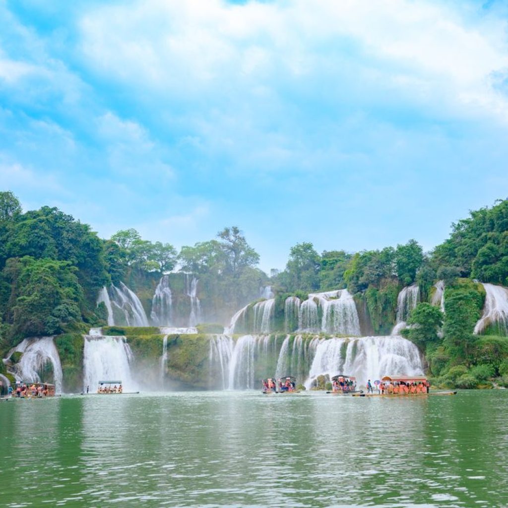Ban Gioc Waterfall in Cao Bang with green mountains and the Quay Son River