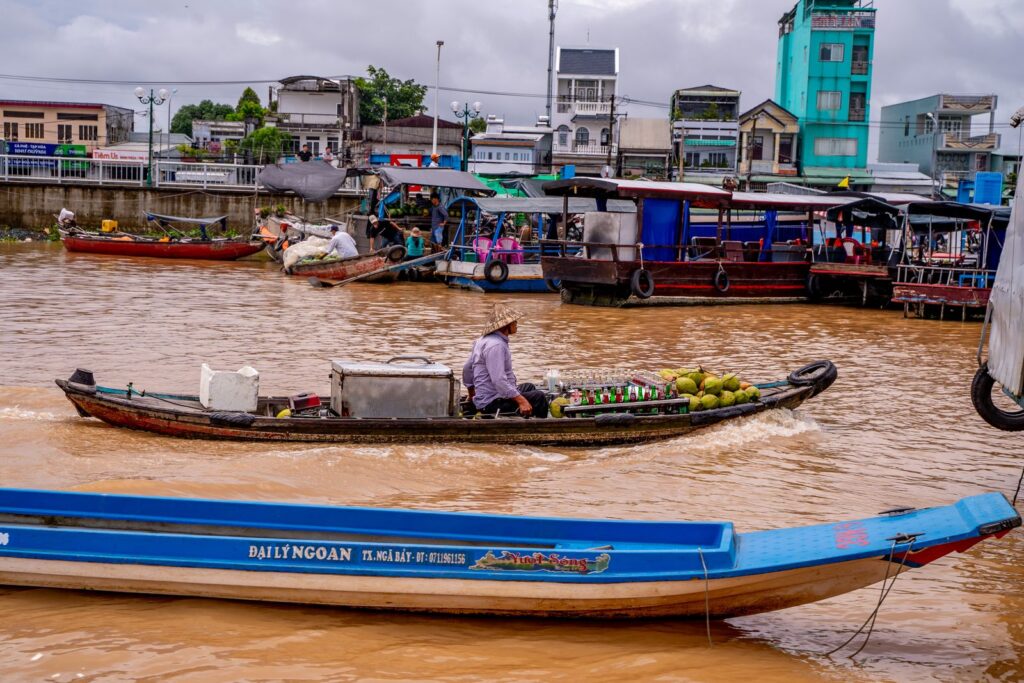 Wooden boats gather at Cai Rang Floating Market in Can Tho