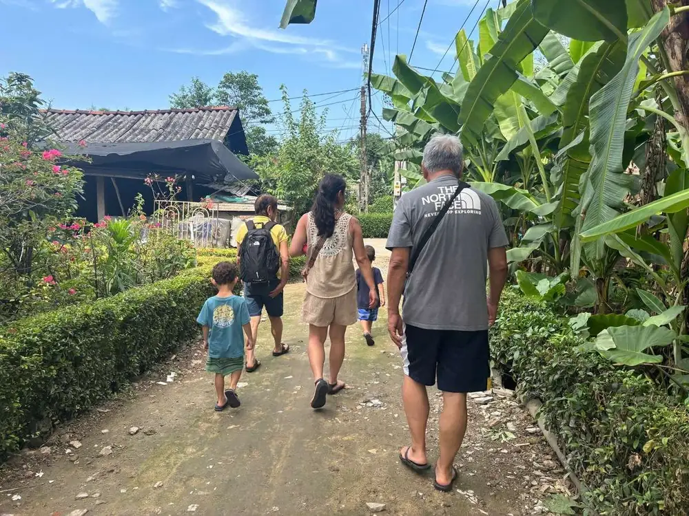 Walking through a bamboo village near Hue on the hidden gem tour