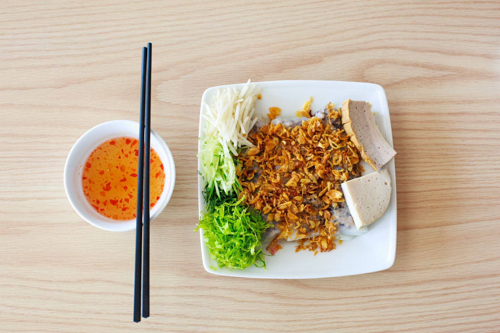 Vietnamese dish with fresh vegetables and chili dipping sauce