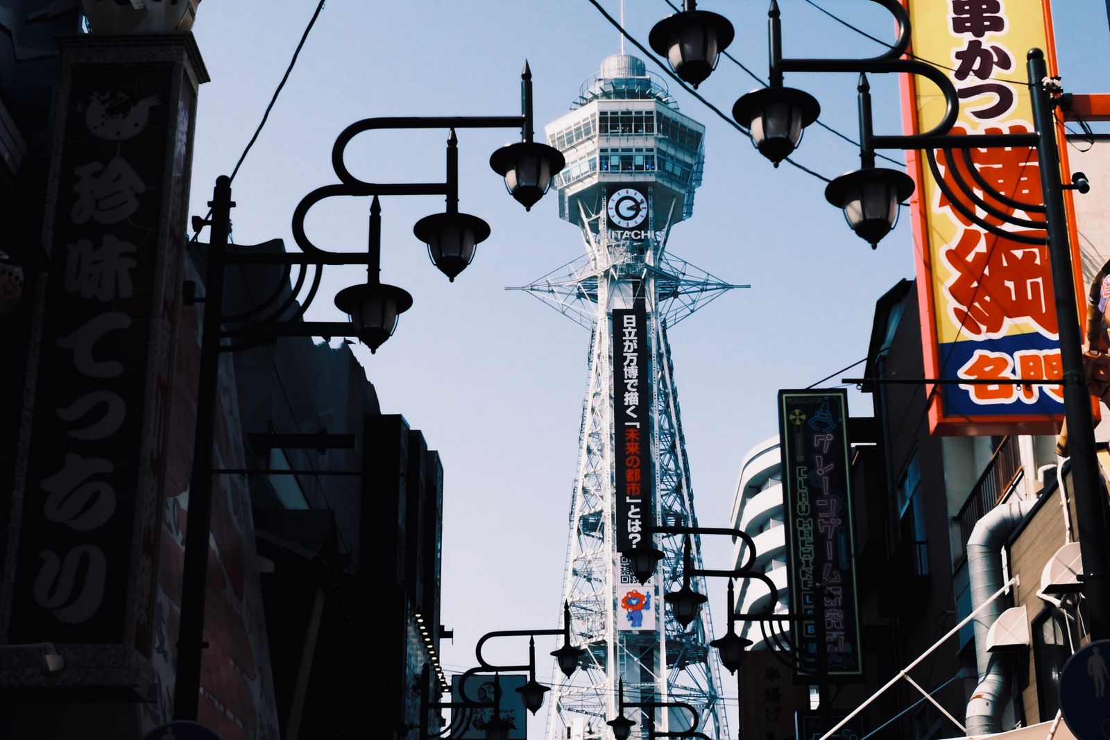 Tsutenkaku Tower and street lamps in Shinsekai, Osaka