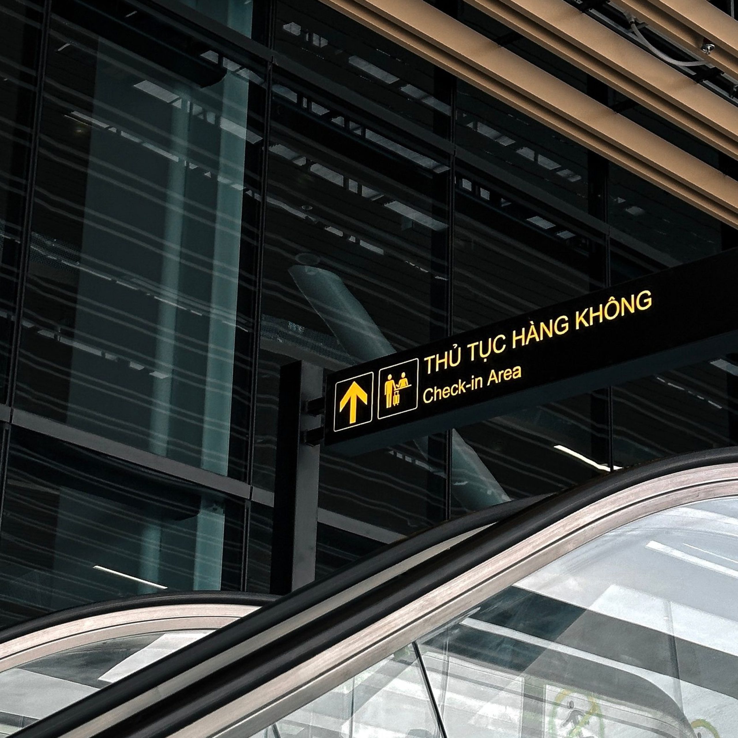 Escalator leading to the check-in area at Tan Son Nhat airport in Ho Chi Minh City