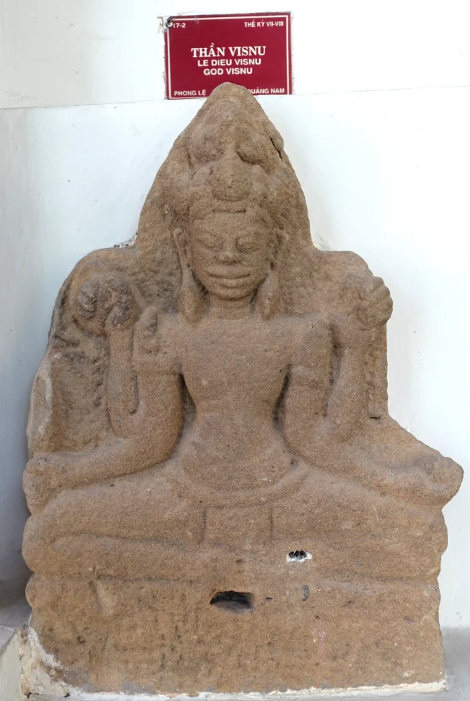 Cham sandstone statue of Vishnu on display at the Da Nang Museum of Cham Sculpture