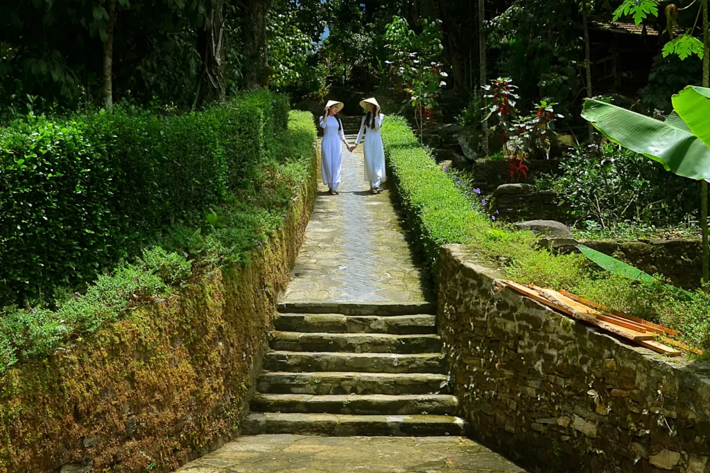 Stone steps and a garden path at Loc Yen Ancient Village in Da Nang.