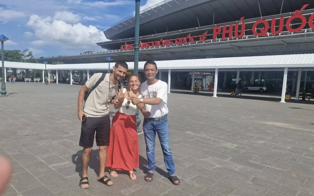A Da Nang volunteer and the Portuguese couple at Phu Quoc International Airport.