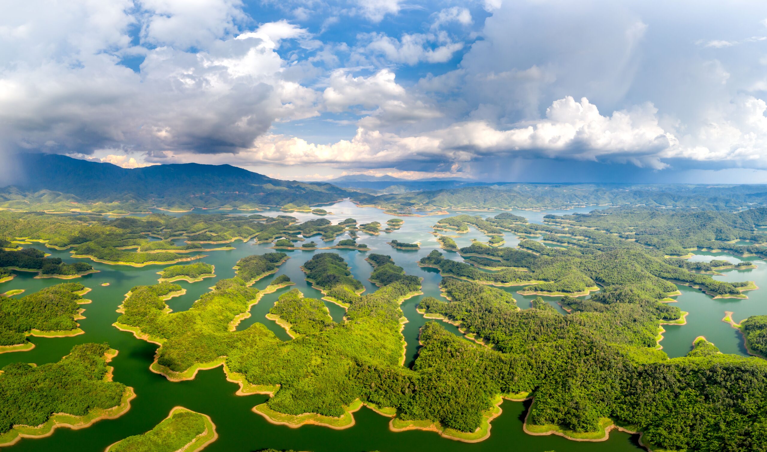 Aerial view of Ta Dung Lake’s forested islands and waterways