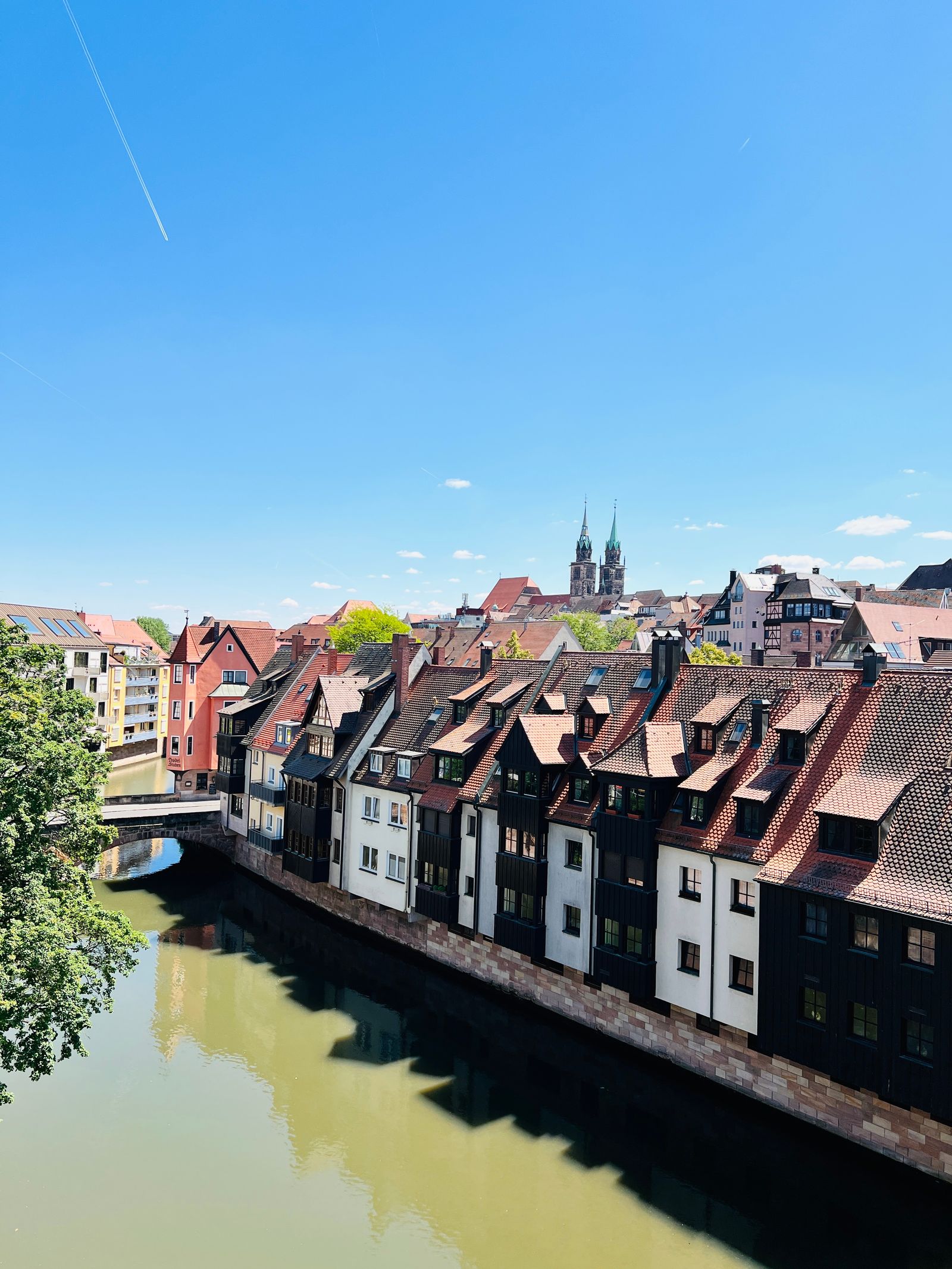 Canal-side houses and historic rooftops in Nuremberg Old Town.