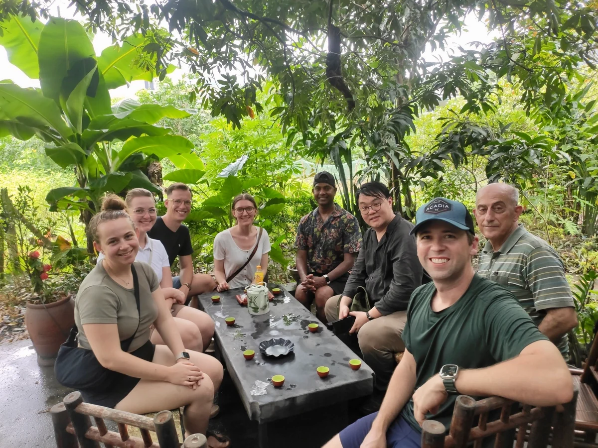 Guests sharing tea at a local farmhouse in Ninh Binh