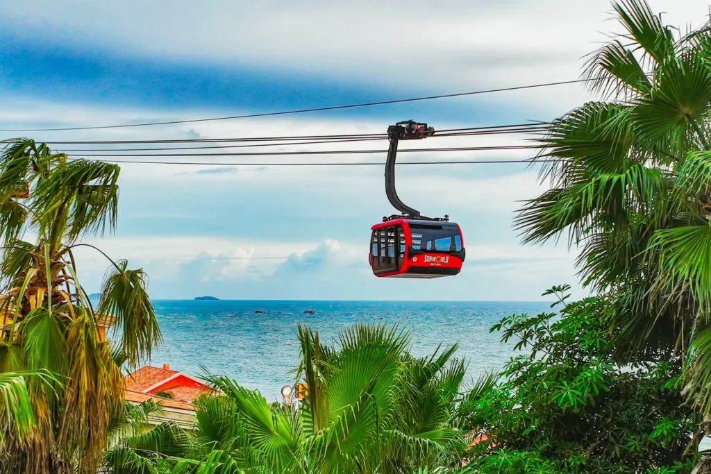 A red cable car cabin above the sea at Hon Thom, Phu Quoc.