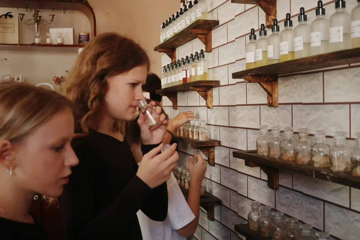 Participants exploring fragrances during a perfume workshop