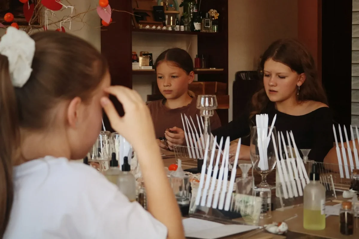 Guests testing fragrance strips during the perfume workshop