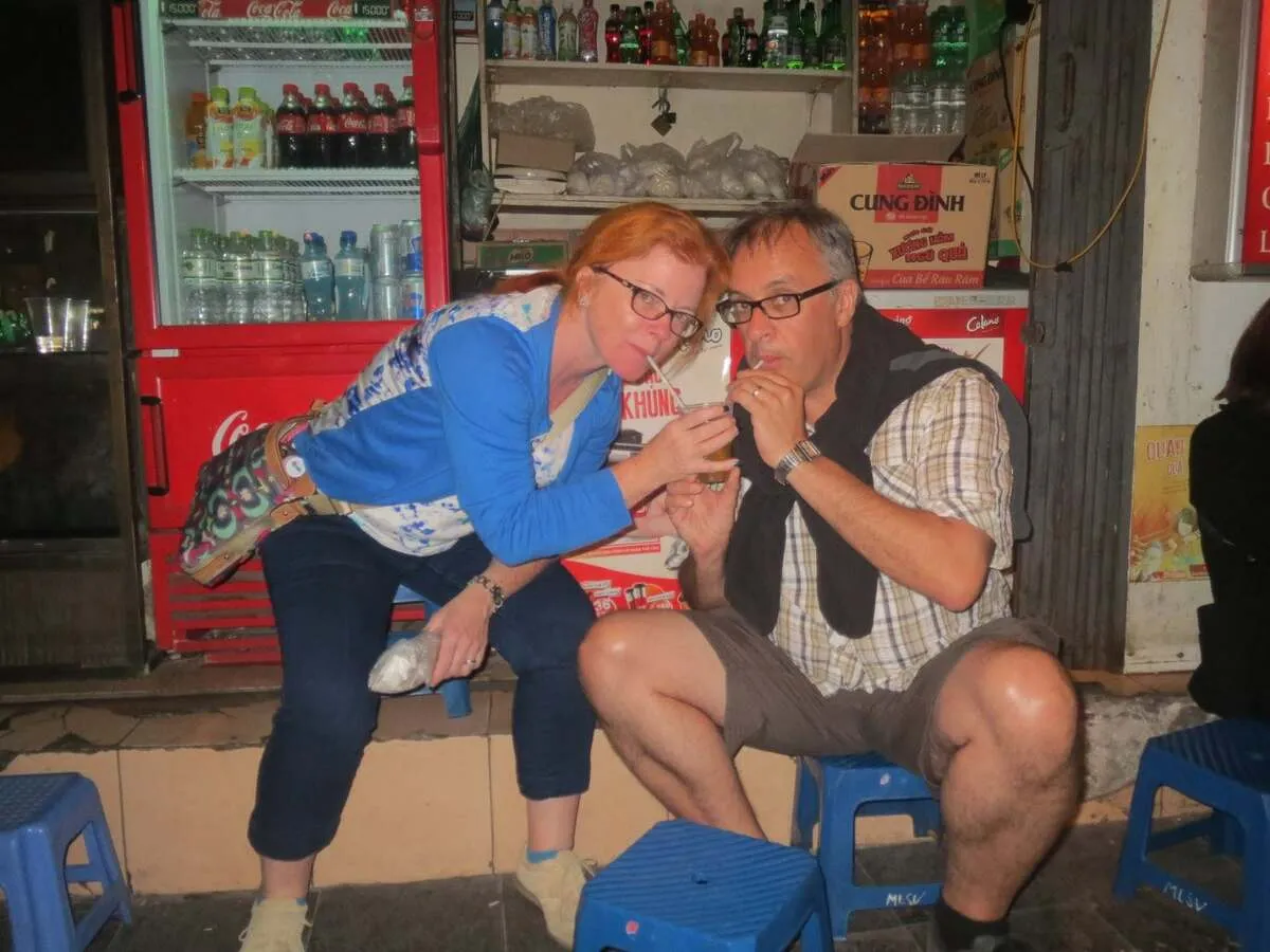 Guests enjoying drinks at a local Hanoi eatery